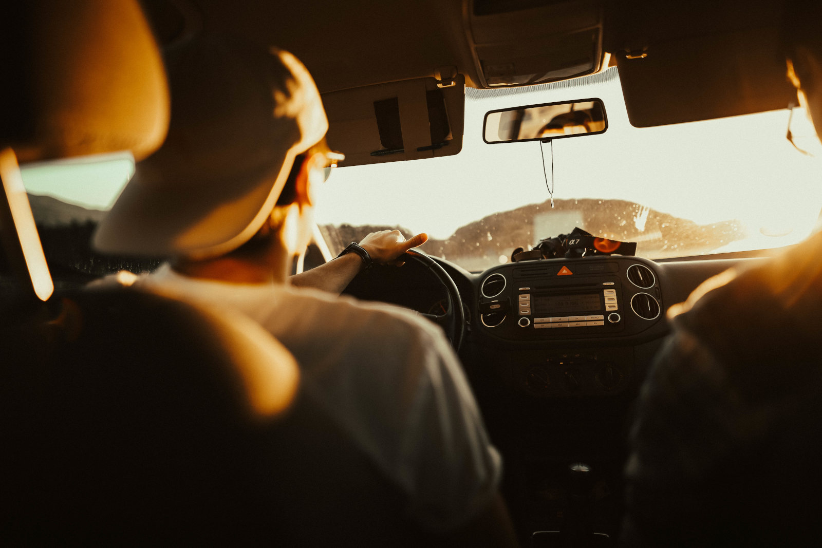 A driver and a passenger in a vehicle.